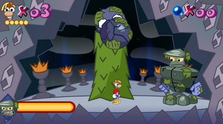Rayman encountering Mr. Mosstone for the first time, where he drops a boulder on him.