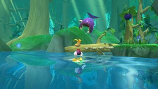 Rayman being attacked by a Piranha.